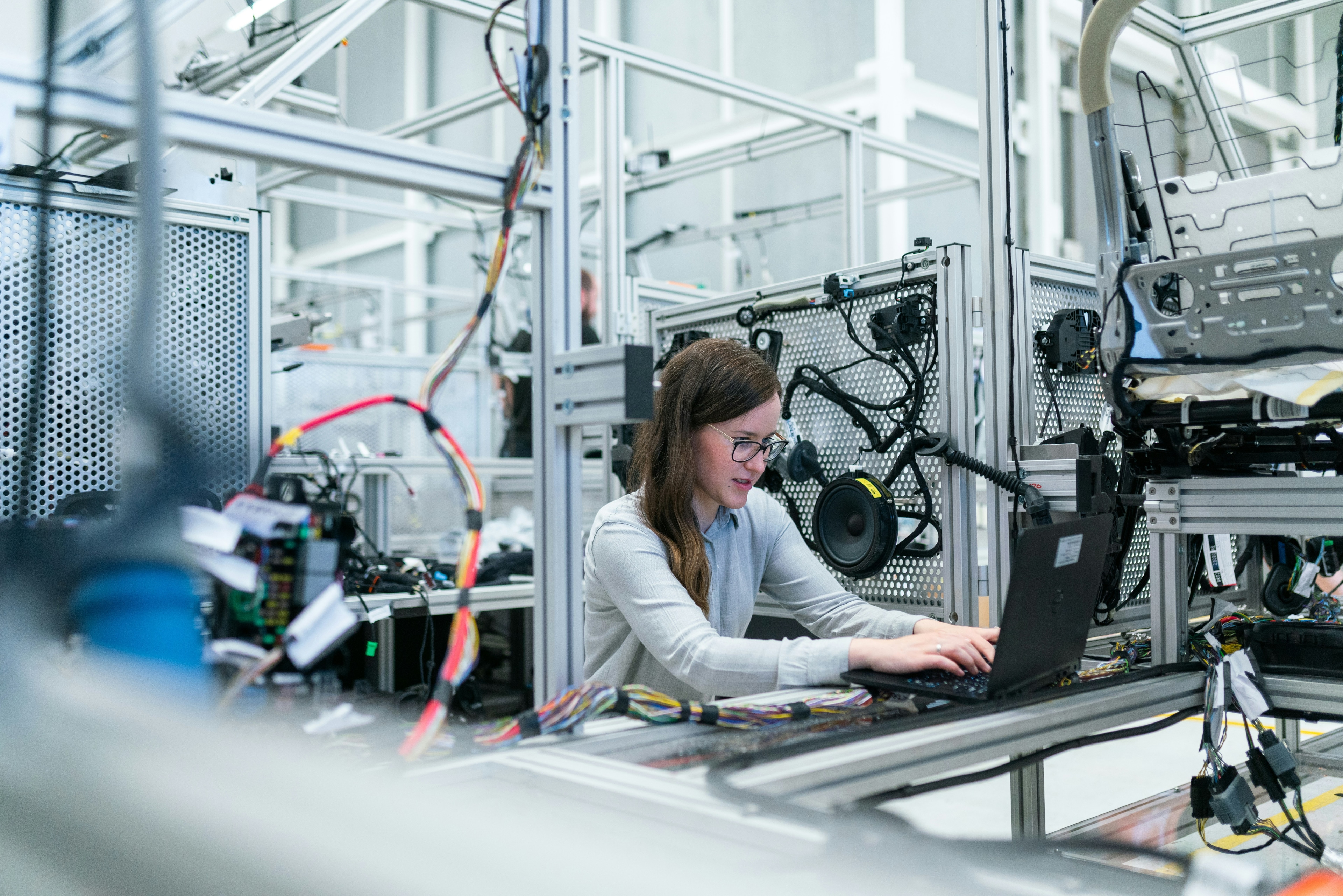 Engineer working at a manufacturing assembly station